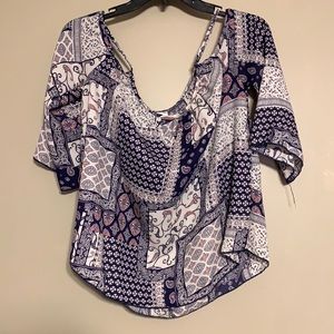 Flow off shoulder shirt